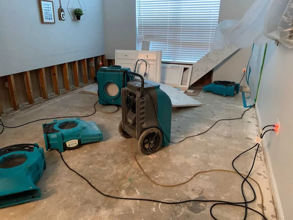Dehumidifier in flood-cut room for Water Damage Restoration in Oakland Park